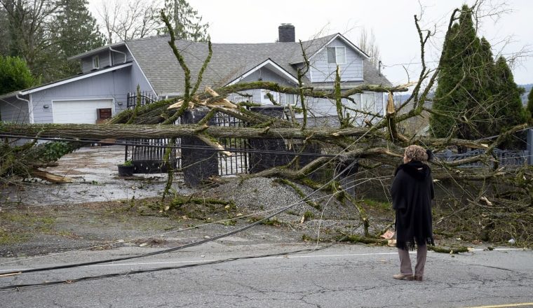 Washington state reels from bomb cyclone as atmospheric river drenches California