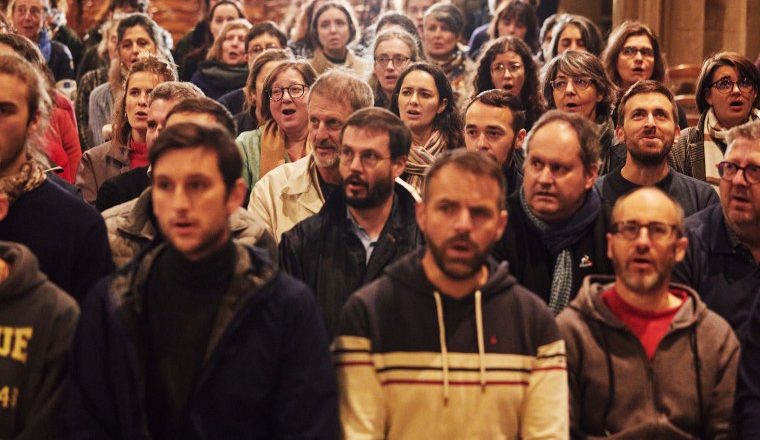 Choir formed from the ashes of the Notre-Dame cathedral helps mark reopening 