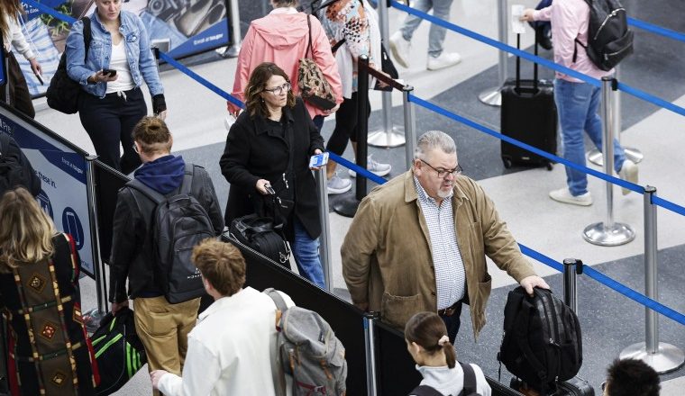 Strikes, rain and snow pose challenges during record Thanksgiving travel week