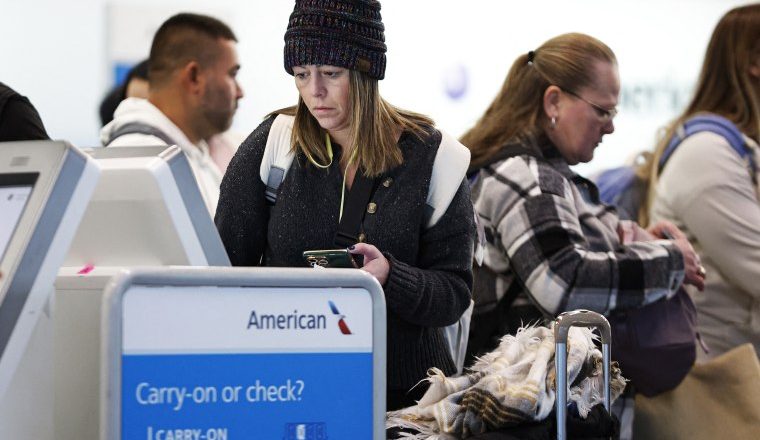 Strikes, rain and snow pose challenges during record Thanksgiving travel week