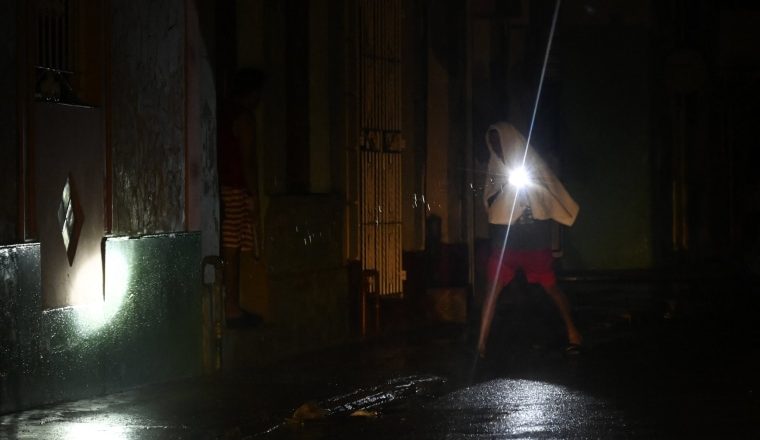 Hurricane Rafael turns west after battering Cuba and knocking out power grid