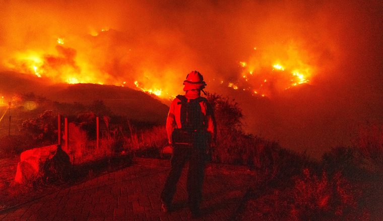 Malibu fire rages on as famous locals evacuate