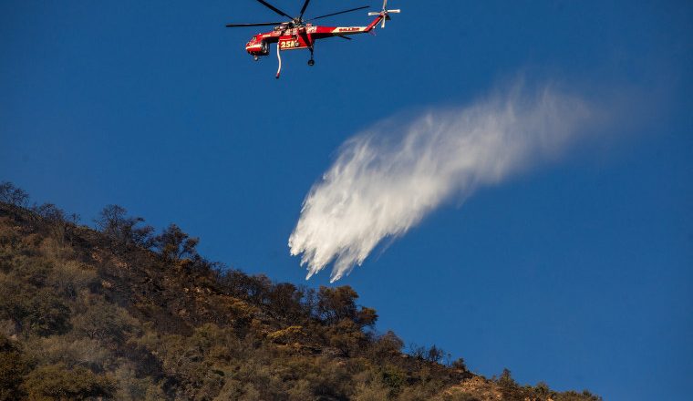 Hughes Fire containment grows after thousands are forced to flee