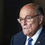 Judge finds Rudy Giuliani in contempt of court in defamation case