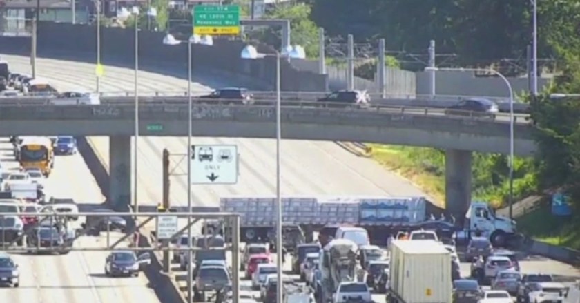 Massive Delays on I-80/35 After Truck Slams Into Barrier, Sends Debris Flying Across Highway
