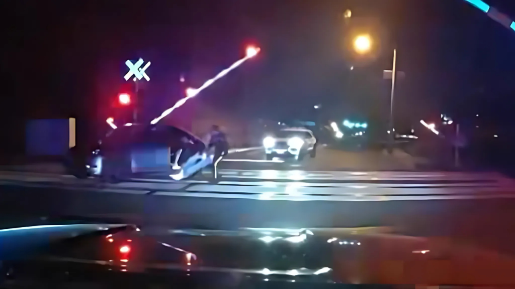 NJ Cops Rescue Driver Seconds Before Train Destroys Stalled Car on Tracks